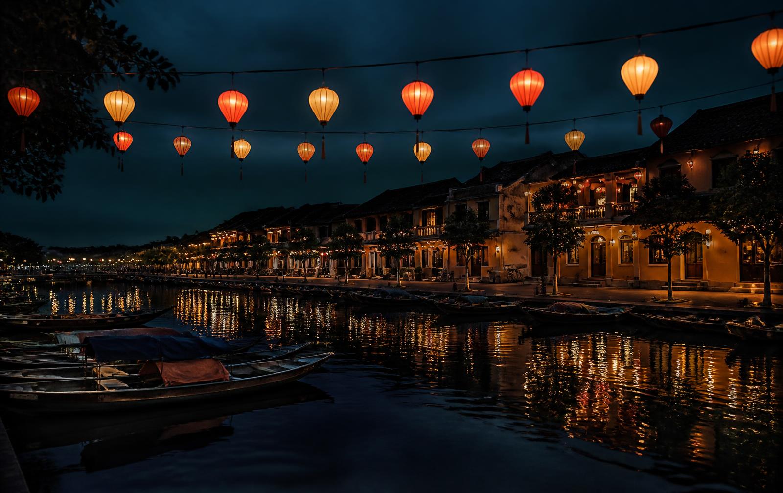 Hoi An ancient town at night with lanterns reflected on the river